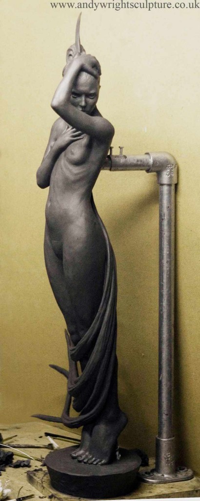 Female nude on toes indoor and outdoor garden statue sculpture